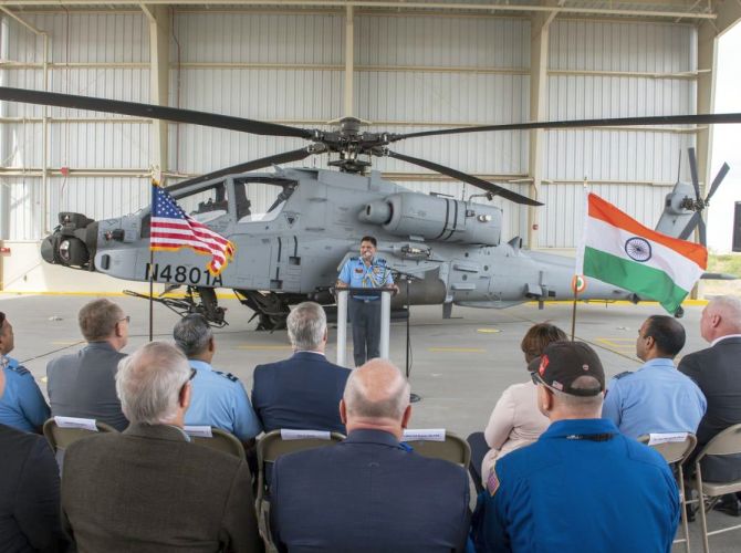 Air Marshal Aravindra Singh Butola speaks at the handing over ceremony at the Boeing's helicopter production facility at Mesa, Arizona.