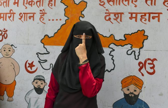 A young voter shows her inked finger after voting in the 6th phase of the Lok Sabha election May 12, 2019. Photograph: PTI Photo