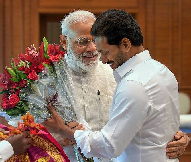 Yuvajana Shramika Rythu Congress Party President and Andhra Pradesh Chief Minister Y S Jaganmohan Reddy hugs Prime Minister Narendra Damodardas Modi, May 26, 2019