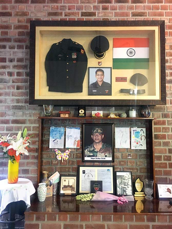 Photographs, uniforms, medals that belonged to martyred Major Akshay Girish.