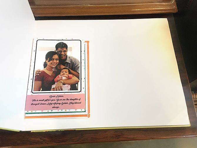A photograph of Major Akshay's young family and a message for his 6-year-old daughter.