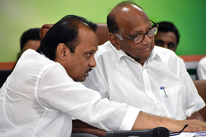 Nationalist Congress Party President Sharad Pawar, right, with nephew Ajit Pawar. Photograph: Saahil Salvi