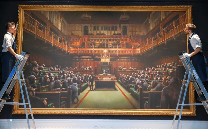 Banksy S Uk Parliament Painting Sells For Record Price Rediff Com India News