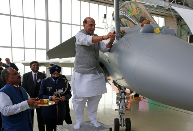 efence Minister Rajnath Singh blesses the Indian Air Force's first Rafale fighter in Merignac near Bordeaux, France, October 8, 2019. Photograph: Regis Duvignau/Reuters 