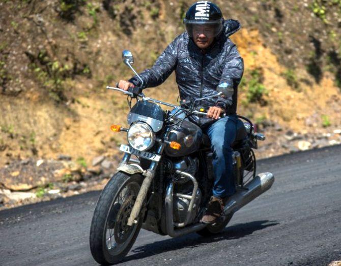 Arunachal CM goes on a bike ride to promote tourism Rediff