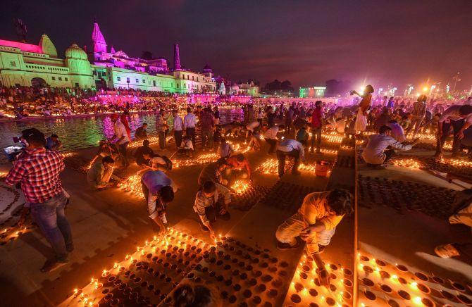 PHOTOS: Ayodhya lit-up with 5 lakh diyas on Diwali eve - Rediff.com ...