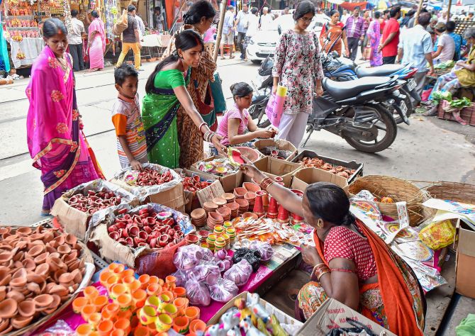 PHOTOS: Indians go on shopping spree ahead of Diwali - Rediff.com India ...