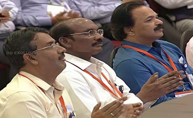 ISRO chief K Sivan along with scientists at ISRO office in Bengalurutors