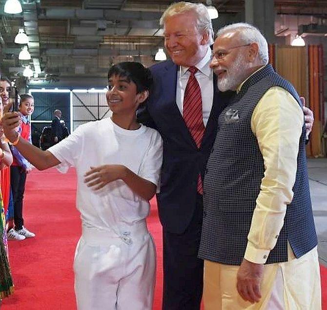 Prime Minister Modi and President Trump take a selfie with a child before the Howdy, Modi event in Houston, September 22, 2019. Photograph: www.narendramodi.in