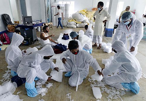 Workers making PPE in Kolkata