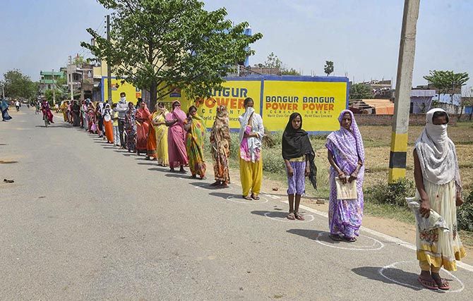 Women in a Bihar village queue up to access their bank accounts. Photograph: PTI Photo 