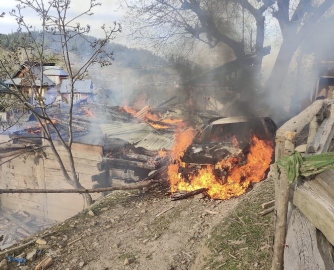 A car on fire after the Pakistan army shelled a village in Kupwara in the Kashmir valley. Photograph: Umar Ganie