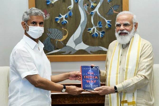 External Affairs Minister Dr Subrahmanyam Jaishankar presents a copy of his book, The India Way: Strategies for an Uncertain World, to Prime Minister Narendra Modi, August 25, 2020 