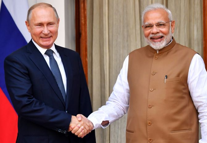 Indian Prime Minister Narendra Modi welcomes Russian President Vladimir Putin 