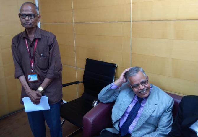 Standing: Govind Dingankar, superintendent of the commission; seated: V V Palnitkar, commission secretary