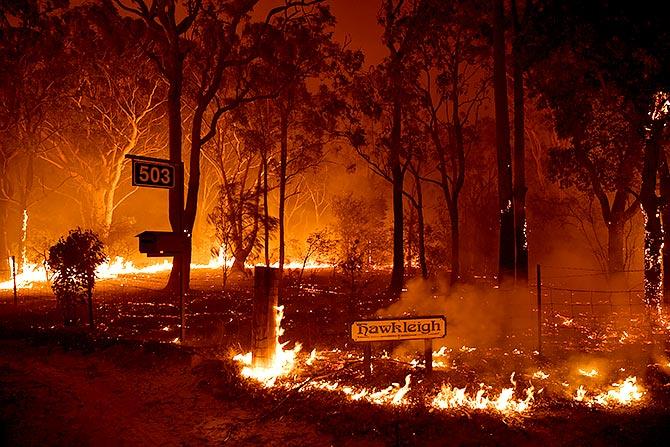 General scenes of bushfire near the town of Sussex Inlet in Sydney