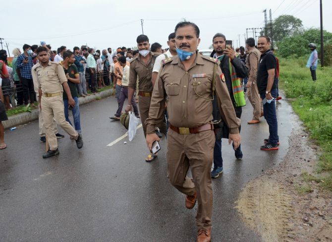 Police personnel at the encounter site near Kanpur 