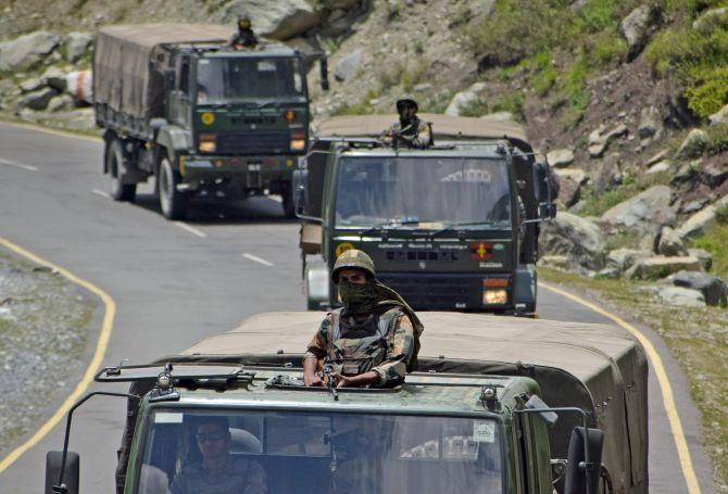 Indian Army trucks move along a highway leading to Ladakh at Gagangeer in Kashmir's Ganderbal district, June 17, 2020. Photograph: Imran Nissar/ANI Photo