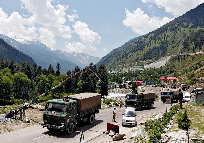 Army trucks move along a highway leading to Ladakh/Danish Ismail/Reuters