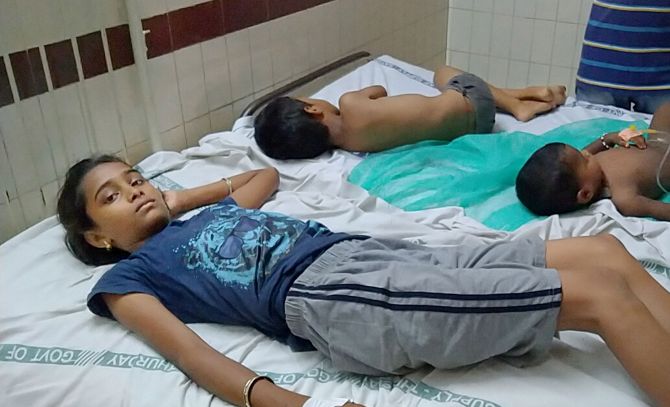 IMAGE: Affected children being treated at King George Hospital after a major chemical gas leakage at LG Polymers industry in RR Venkatapuram village, Visakhapatnam, on Thursday. Photograph: PTI Photo