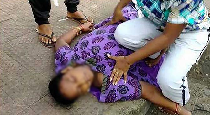 A victim lies unconscious on the road in Vizag