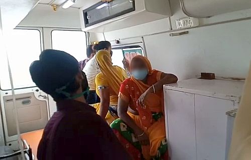 Mother of the Hathras victim being taken to hospital. Pic: ANI