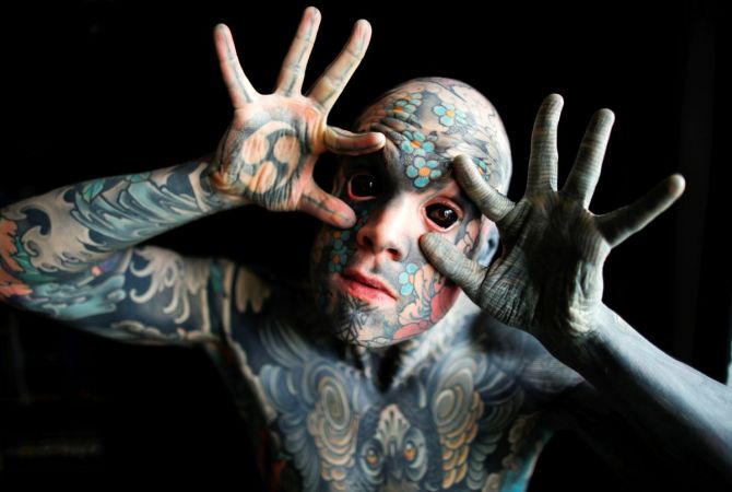 Man covered his face with tattoos. - Rediff.com India News