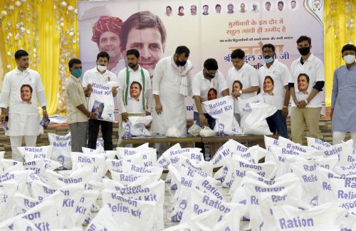 Congress workers distribute free ration