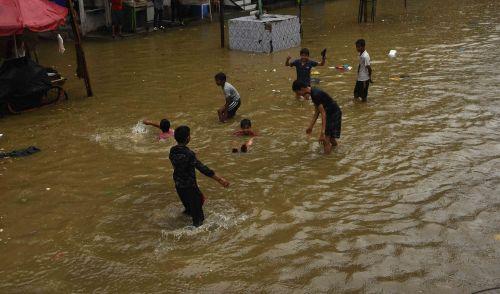 Boys will be boys on a rainy day. Pic Sahil Salvi