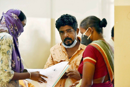 A Black Fungus patient's family checks the reports