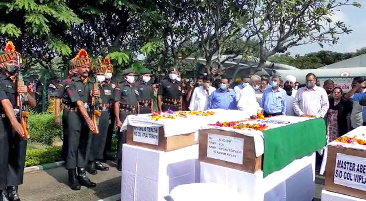 People and Army personnel pay last respect to the mortal remains of Col Viplav Tripathi, Commanding officer of Khuga Battalion of the Assam Rifles, and his family members, in Raigarh.