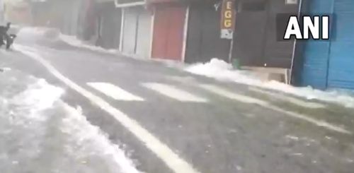 A video grab of water gushing through a street in Nainital