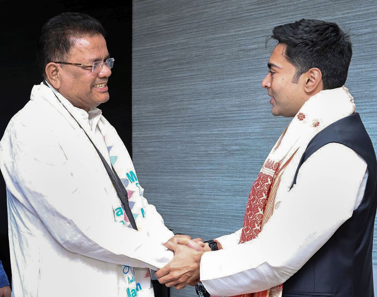 Assam TMC president Ripun Bora (left) with with party's national general secretary Abhishek Banerjee/File image