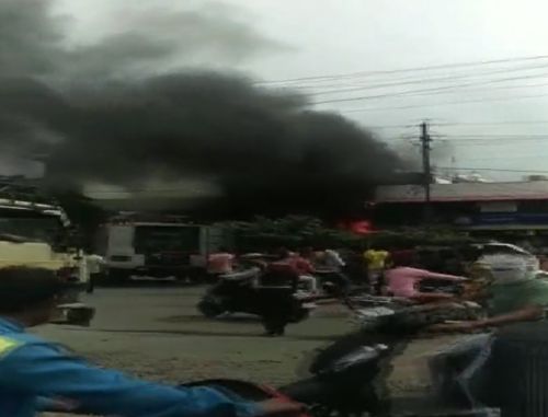 A video grab showing smoke bellowing out of the hospital building