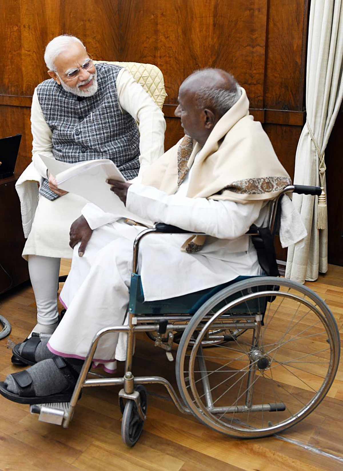 PM Modi with Deve Gowda. File pic