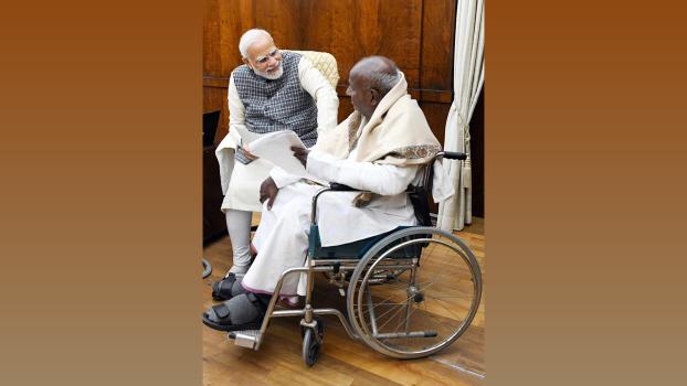 PM Modi with Deve Gowda. File pic