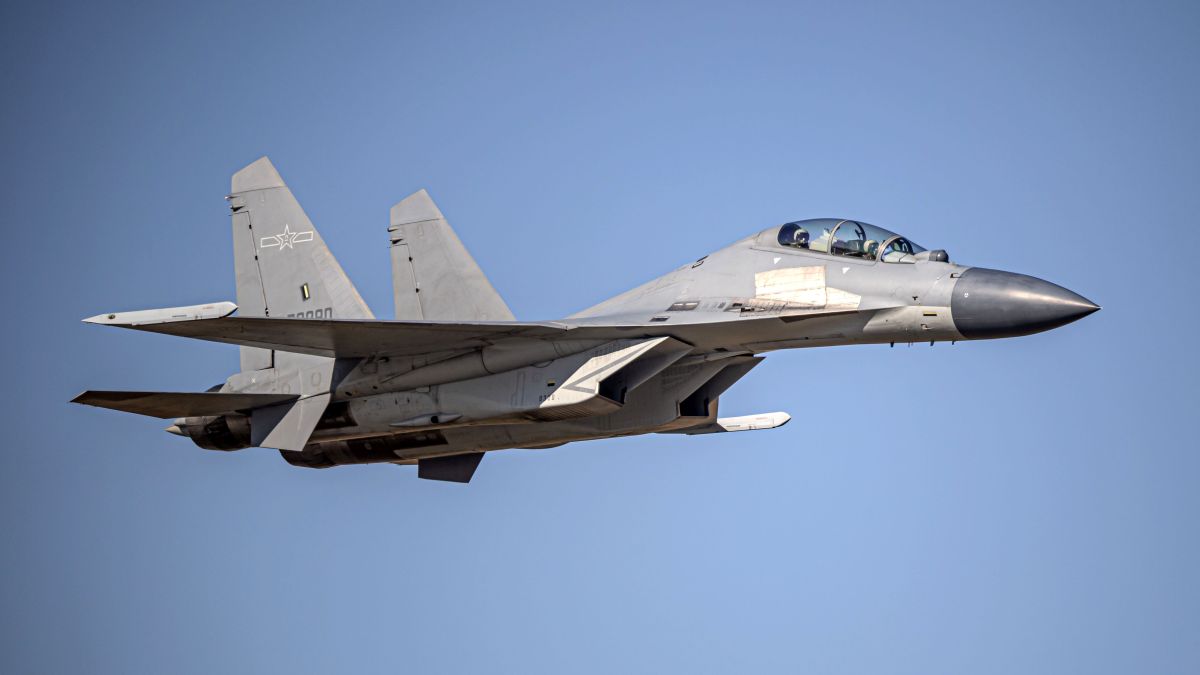 Chinese fighter jet endangers Australian plane near South China Sea - Rediff.com India News