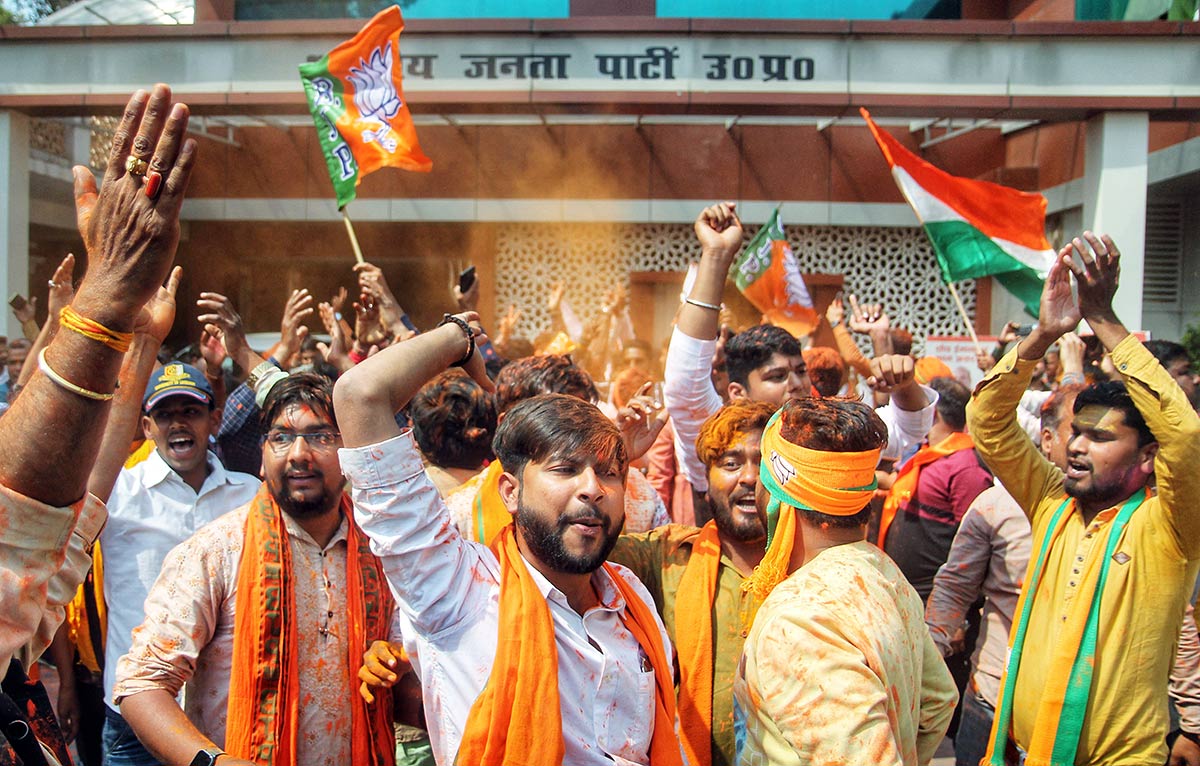 BJP workers celebrate the party's spectacular win in UP