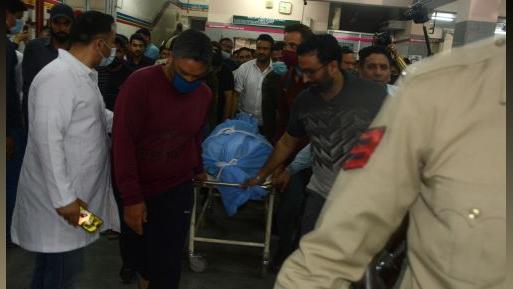 Rahul Bhat's body being taken from the hospital. Pic: Umar Ganie