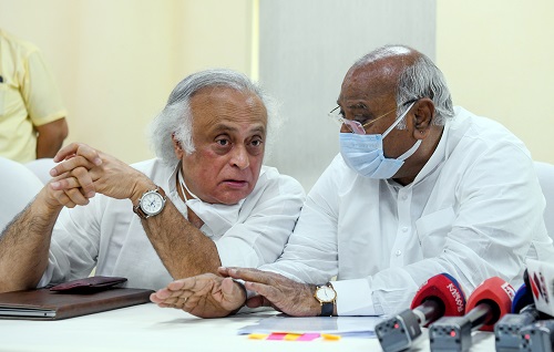 Mallikarjun Kharge and Jairam Ramesh (left)