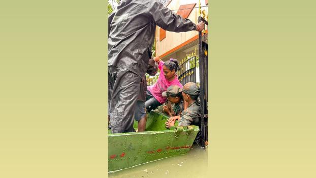 Soldiers shifting people to safe areas in Chennai after heavy rain flooded city/ANI