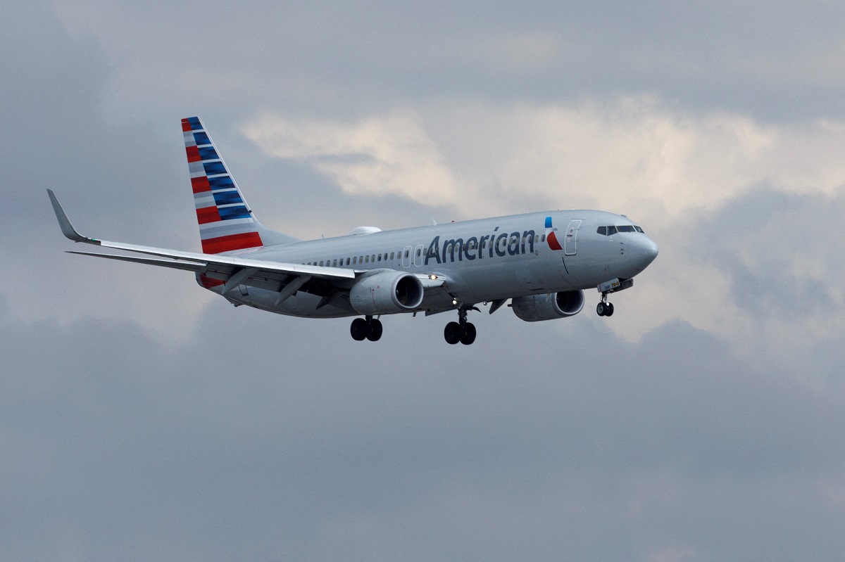 American Airlines flyer booked for peeing on passenger