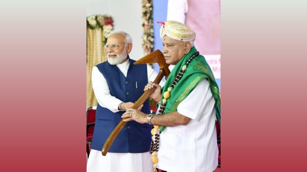 BJP leader B S Yediyurappa with the PM. File pic
