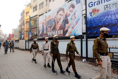 Cops patrol outside a theatre during first-day first show of 'Pathaan' in Guwahati/ANI