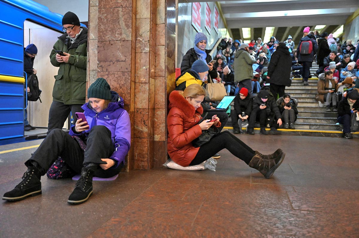 People take shelter at a metro station in Kyiv. Viacheslav Ratynskyi/Reuters