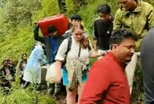 Tourists being evacuated in Kasol