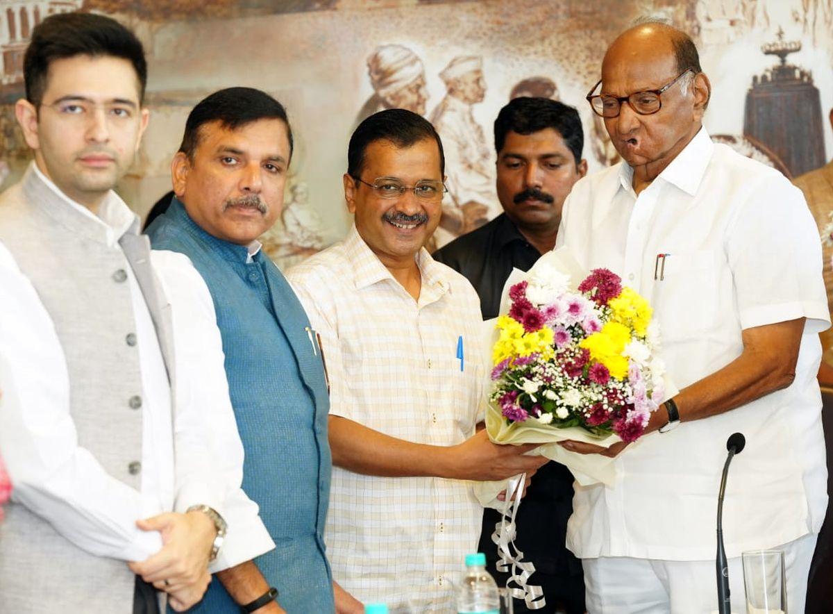 The Delhi CM and AAP ministers with Sharad Pawar yesterday