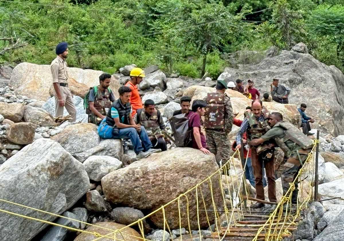 Army personnel help people affected by the cloudburst