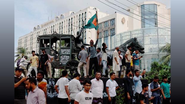 People celebrate the resignation of Sheikh Hasina in Bangladesh
