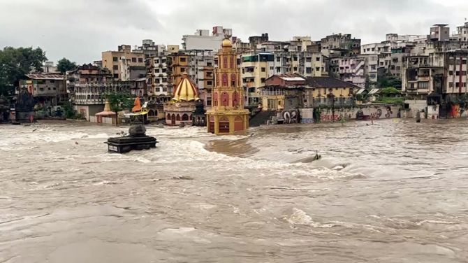 Temples got partially submerged in the Godavari river